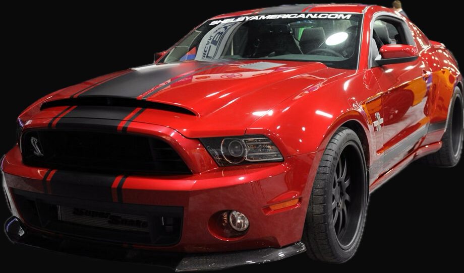 Red Shelby GT500 with black racing stripes